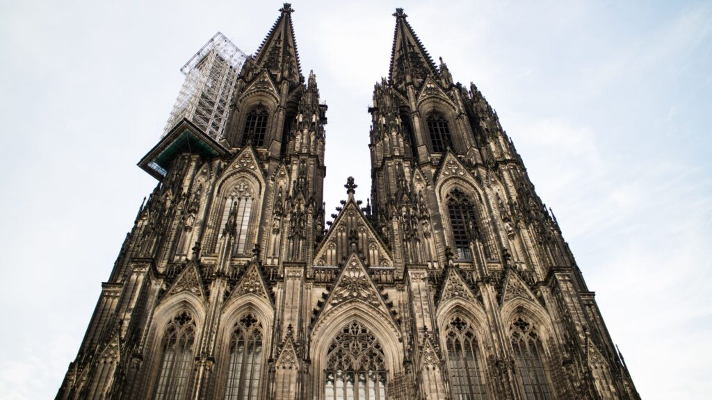 pexels photo 130350 130350 Stunning Gothic architecture of Cologne Cathedral in Germany against a clear sky.