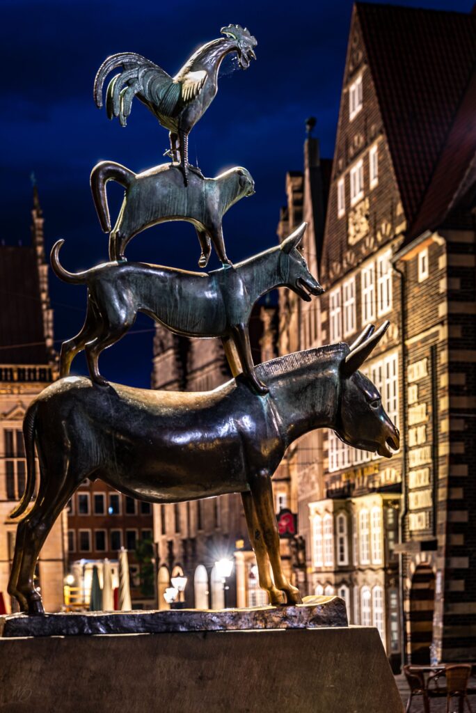 pexels photo 4934992 4934992 Night view of the Bremen Town Musicians statue, a fairy tale landmark in Bremen, Germany.